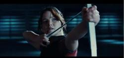 hunger games katniss sharp shoots bow and arrow image